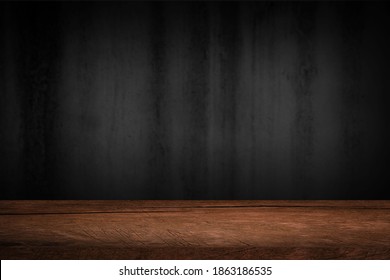 Free space on a wooden table for displaying products with a blurred black wall background. - Shutterstock ID 1863186535