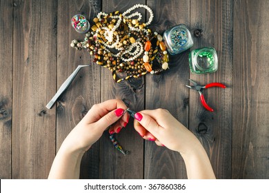 Free time evening making beads. Woman leisure home work - Powered by Shutterstock