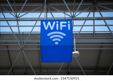 Free wi-fi station in a public place. Free Wi-Fi sign at the airport or other public place to connect. - Powered by Shutterstock