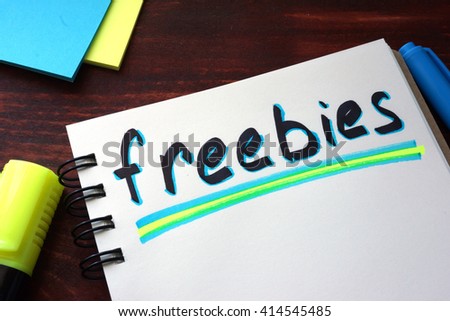 Freebies written on a notepad with marker.