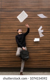 Freedom Carefree Business Man Throws Papers In The Air. No More Work Today.