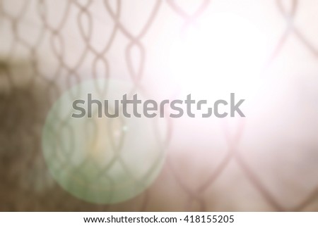 Freedom concept background. Abstract barbed wire blur city background.