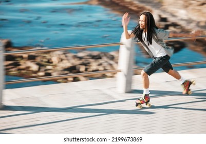 Freedom, Energy And Roller Skating With Black Man Training And Exercise Along A Beach Outdoors. Active African American Enjoying Intense Speed Practice Of Fitness Hobby, Cardio And Balance Workout