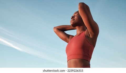 Freedom, fitness and black woman in nature for running, sports training and relax against a blue sky in South Africa. Wellness, peace and calm African runner with zen from an outdoor cardio workout - Powered by Shutterstock