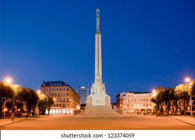 Freedom monument in Riga at night.