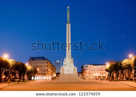 Freedom monument in Riga at night.