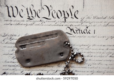 Freedom is not free . Dog tag on American Constitution