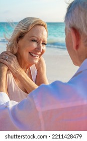 Freedom Outdoors By The Ocean For Happy Senior Caucasian Couple Enjoying Romantic Getaway At Tropical Island Resort Bahamas