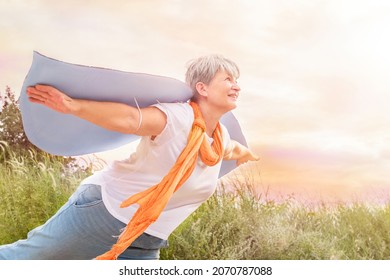 Freedom Senior Woman In Wings On The Field Happy Spread Her Arms