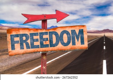 Freedom sign with road background - Shutterstock ID 267262352