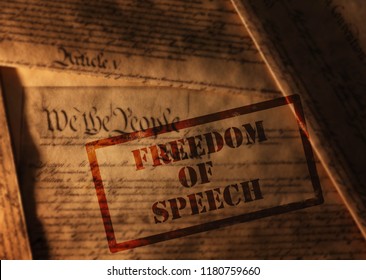 Freedom of Speech stamp on pages of the United States Constitution                      