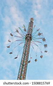 Freefall Tower Carousel Carnival Ride Against Sky