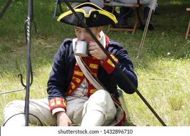 Freehold, New Jersey / USA - June 22, 2019: Revolutionary War Colonial Soldier Reenactors In Bluecoat Uniforms