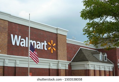 Freehold, NJ/USA - September 13 2019 Walmart Store Front American Flag Half-staff 