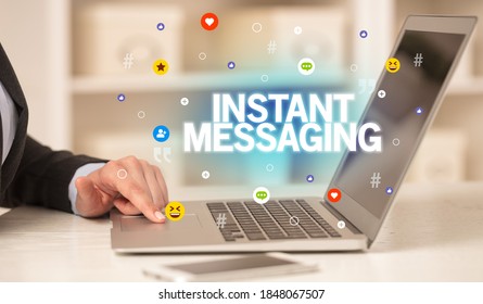 Freelance Woman Using Laptop With INSTANT MESSAGING Inscription, Social Media Concept