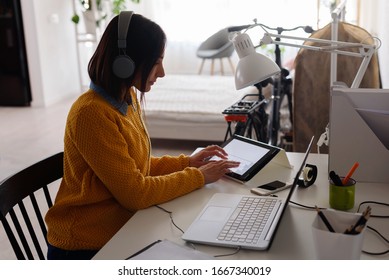 Freelance Woman Working In Home Office With Laptop Computer. Flexible Workspace And Working Time.