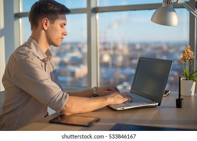 Freelance work. man working on laptop computer.