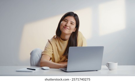 Freelancer woman work using computer laptop sit at home. Joy busy girl type e mail wear yellow t shirt. Remote education during covid 19 corona virus. Distance job start up. Online internet shopping.