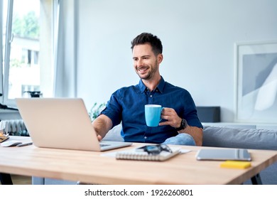 Freelancer working at home drinking coffee
