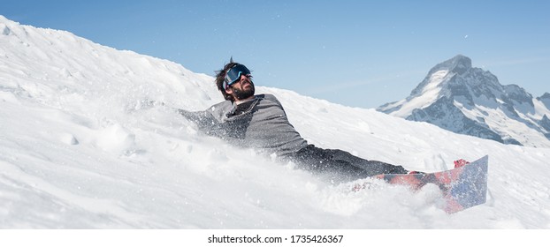 Freerider Snowboarder Drop Fall Down And Crash With His Snowboard On Extreme Gradient Downhill. Winter Mountain Freeride