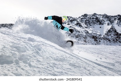 Freerider Snowboarder Moving Down In Snow Powder 