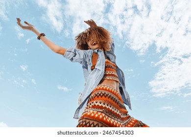 Free-spirited Summer Beauty: Young Caucasian Woman Enjoying Outdoor Freedom in a Sunny Field - Powered by Shutterstock