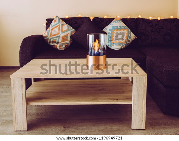 Freestanding Portable Glass Copper Metal Fireplace Stock Photo