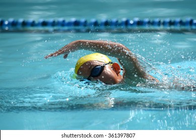 Freestyle Swimming Stroke Of Kid Swimmer On Pool In Race 