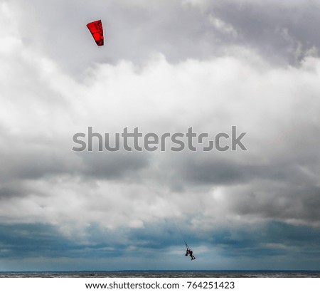 Similar – Image, Stock Photo high achiever Kitesurfing