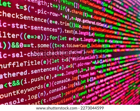 Freeware open source project. Mobile app building. Binary digits code editing. Programming text on dark screen. 