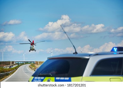 Freeway 20, Germany - August 30, 2020: Police Car And Helicopter During A Rescue Operation On A Motorway In Germany.