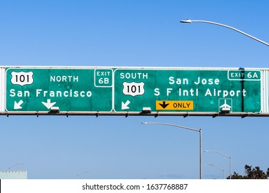 Freeway interchange in San Francisco Bay Area; Freeway signage providing information about the lanes going to 101 North towards San Francisco and 101 South towards San Jose and SFO