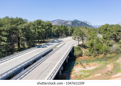 Freeway Road, Bridge, Mountain, Highway In Forest. Aerial View, 4K Video Shooting.