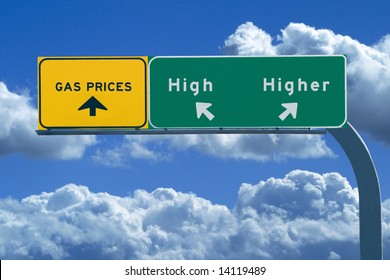 Freeway sign on blue cloudy skies reading, Gas prices - high and higher