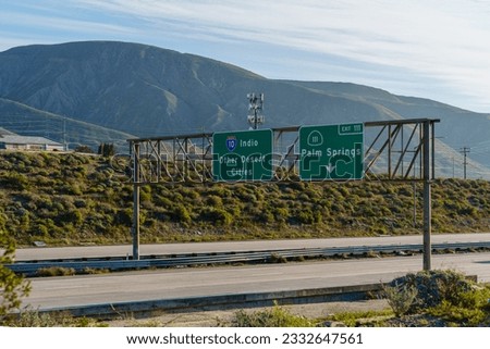 Freeway signs on Interstate 10 I-10 for Other Desert Cities, Indio, and 111 Palm Springs, California
