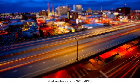 Freeway Traffic Moves Through Spokane, Washington As Night Falls