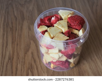 Freeze dried fruits and berries. Dehydrated product in plastic container. Natural candies and sweets - Powered by Shutterstock