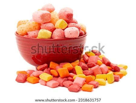 Freeze Dried Rainbow Flavored and Pastel Colored Chewy Candy Squares Isolated on a White Background