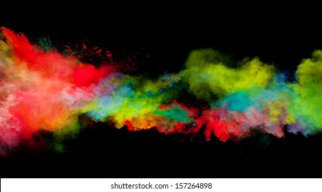 Freeze motion of colored dust explosion isolated on black background - Shutterstock ID 157264898