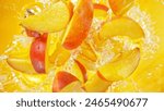 Freeze Motion of Flying Peaches Slices into Water, Colored Background. Concept of Flying Fresh Fruit, Splashing into Water.