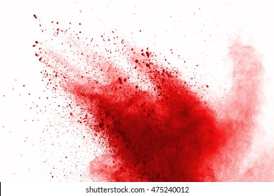 Freeze Motion Of Red Color Powder Exploding On White Background.