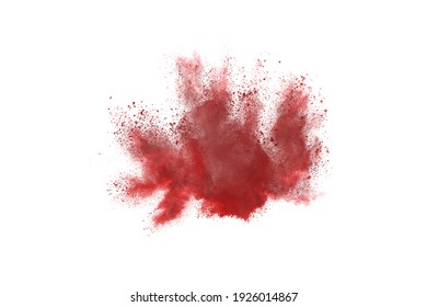 Freeze motion of red powder exploding, isolated on white, white background. Abstract design of red dust cloud. Particles explosion screen saver, wallpaper with copy space. Planet creation concept