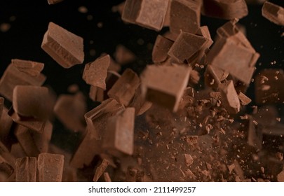 Freeze Motion Shot Of Exploding Chocolate Chunks, Close-up