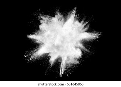 Freeze motion of white color powder exploding on black background. - Shutterstock ID 651645865