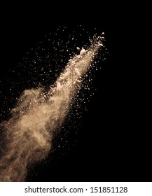 Freeze Motion Of White Dust Explosion Isolated On Black Background