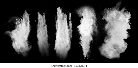 Freeze Motion Of White Dust Explosion Isolated On Black Background