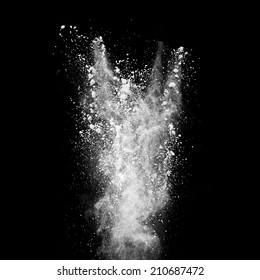 Freeze Motion Of White Dust Explosion Isolated On Black Background