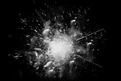Freeze Motion Of White Paint Powder Exploding, Isolated On Black, Dark Background. Abstract Design Of White Dust Cloud. Particles Explosion Screen Saver, Wallpaper Copy Space. Planet Creation Concept
