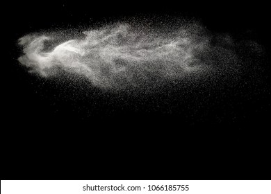 Freeze Motion Of White Particles On Black Background.  