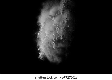 Freeze Motion Of White Particles On Black Background. Powder Explosion. Abstract Dust Overlay Texture.